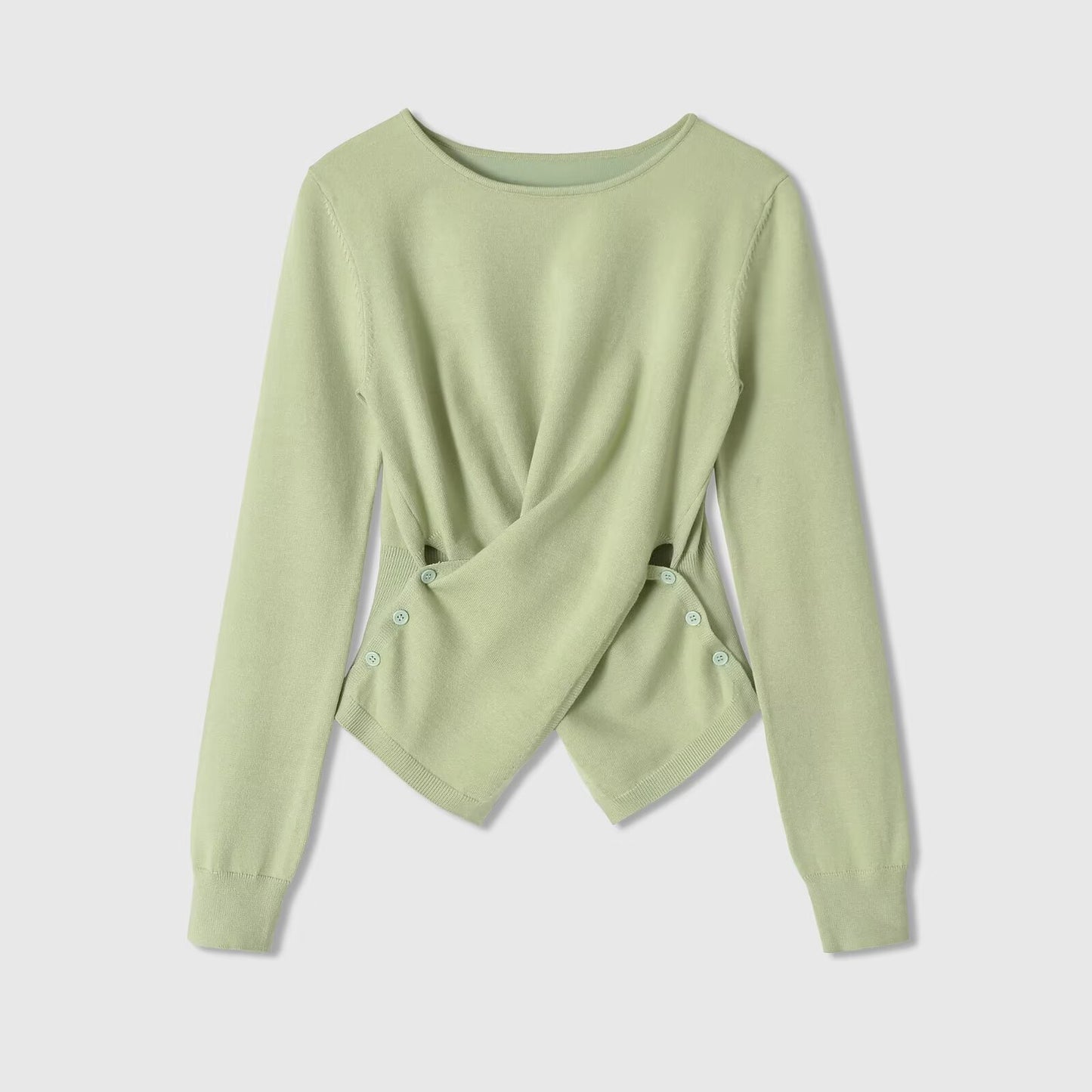 Long sleeved round neck asymmetrical hem knitted top