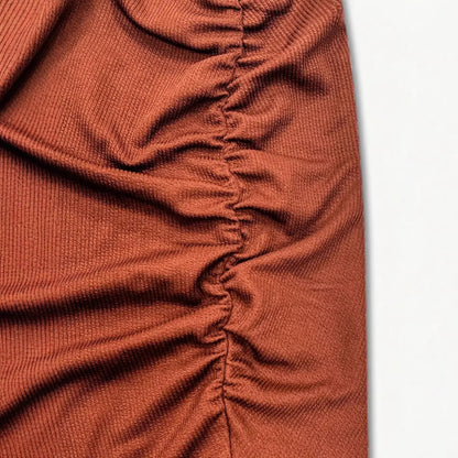 Tight fitting hip hugging skirt