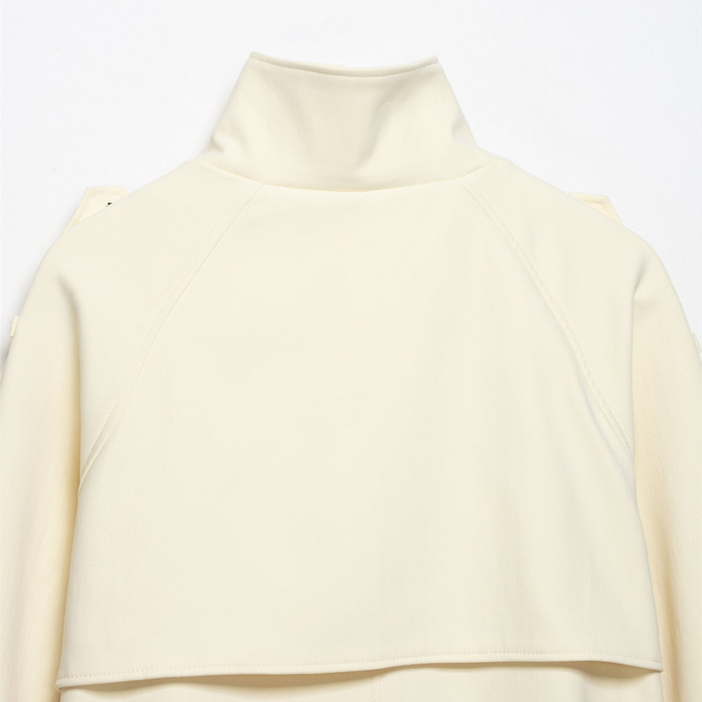 Veste coupe-vent à col montant, épaules incurvées et ceinture, style trajets quotidiens