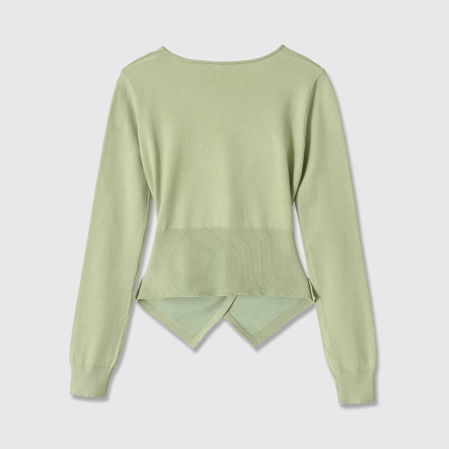 Long sleeved round neck asymmetrical hem knitted top